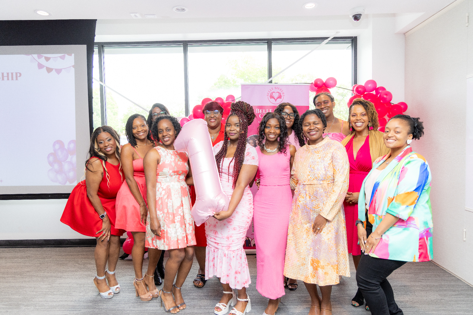 Three Black and Brown women entrepreneurs laughing together